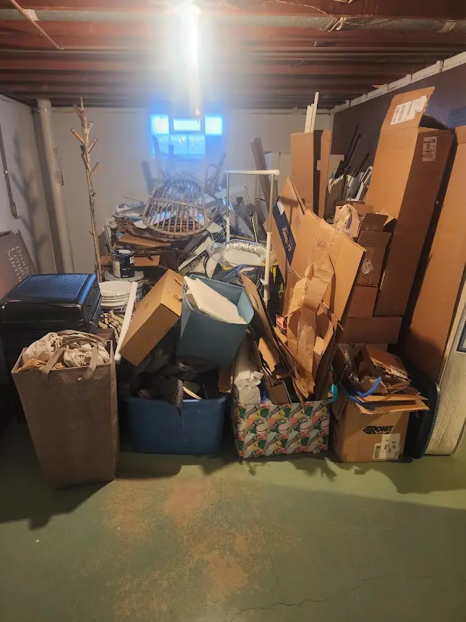 Roll-off dumpster container at job site for 6 Yard Dumpster Rental in Otsego